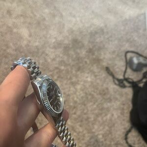 black and silver luxury watch